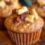 Freshly baked Pumpkin Banana Muffins on a wooden board